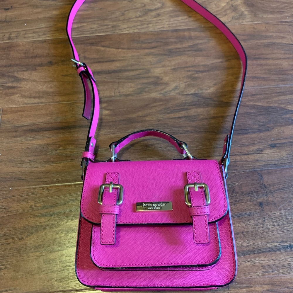 Bright pink small Kate spade purse w/handle/strap